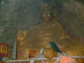 Image of Guru Rinpoche in his retreat cave above the lake